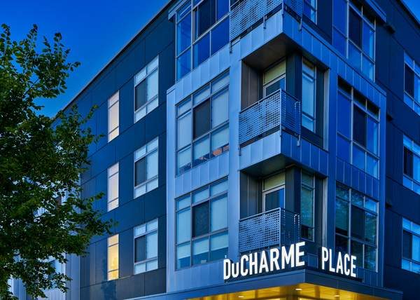 Custom laser-cut steel balcony railings at DuCharme Place Detroit