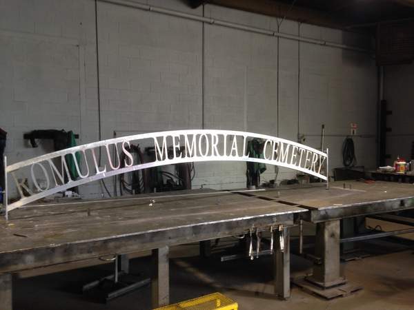 Custom water jet-cut steel memorial sign