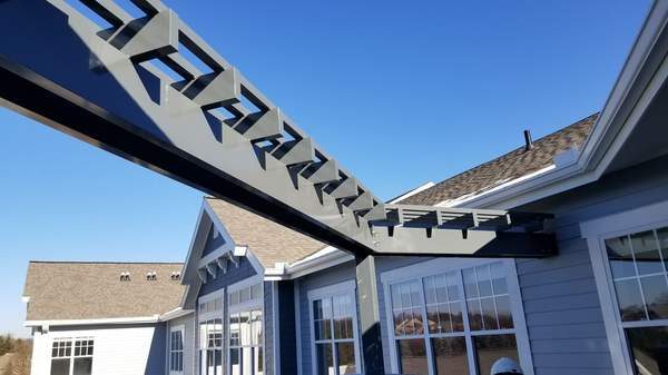 Custom steel sun shades on commercial building