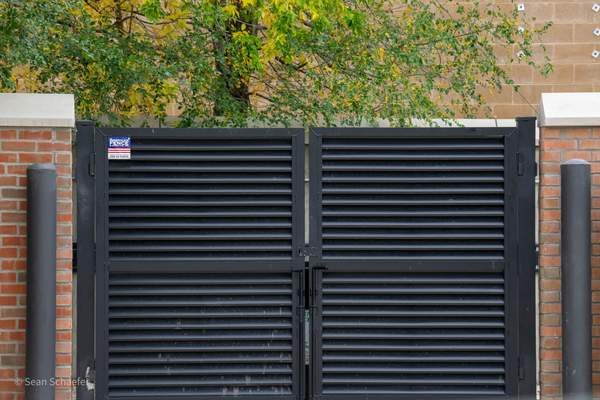 Custom aluminum AmeriLouver dumpster enclosure gates