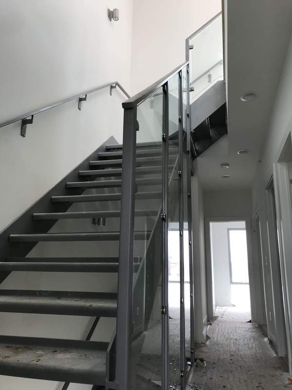 Custom steel spiral staircase at Commonwealth McCann