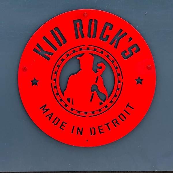 Custom laser-cut steel logo panels