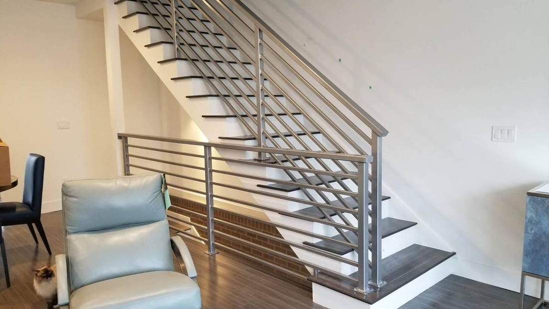 Custom steel stringer staircase with wood treads