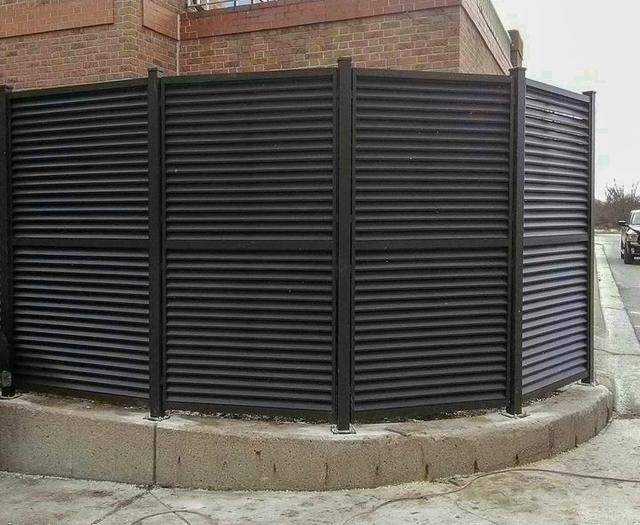 Curved AmeriLouver HVAC enclosure in Dark Brown