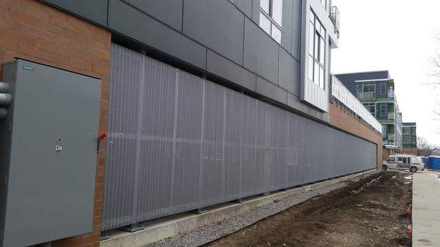 Custom perforated aluminum fence