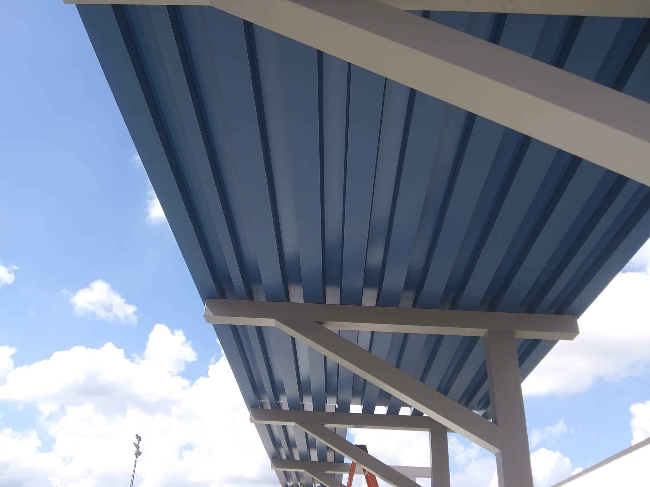 Custom metal (aluminum) canopy at Walled Lake Western High School