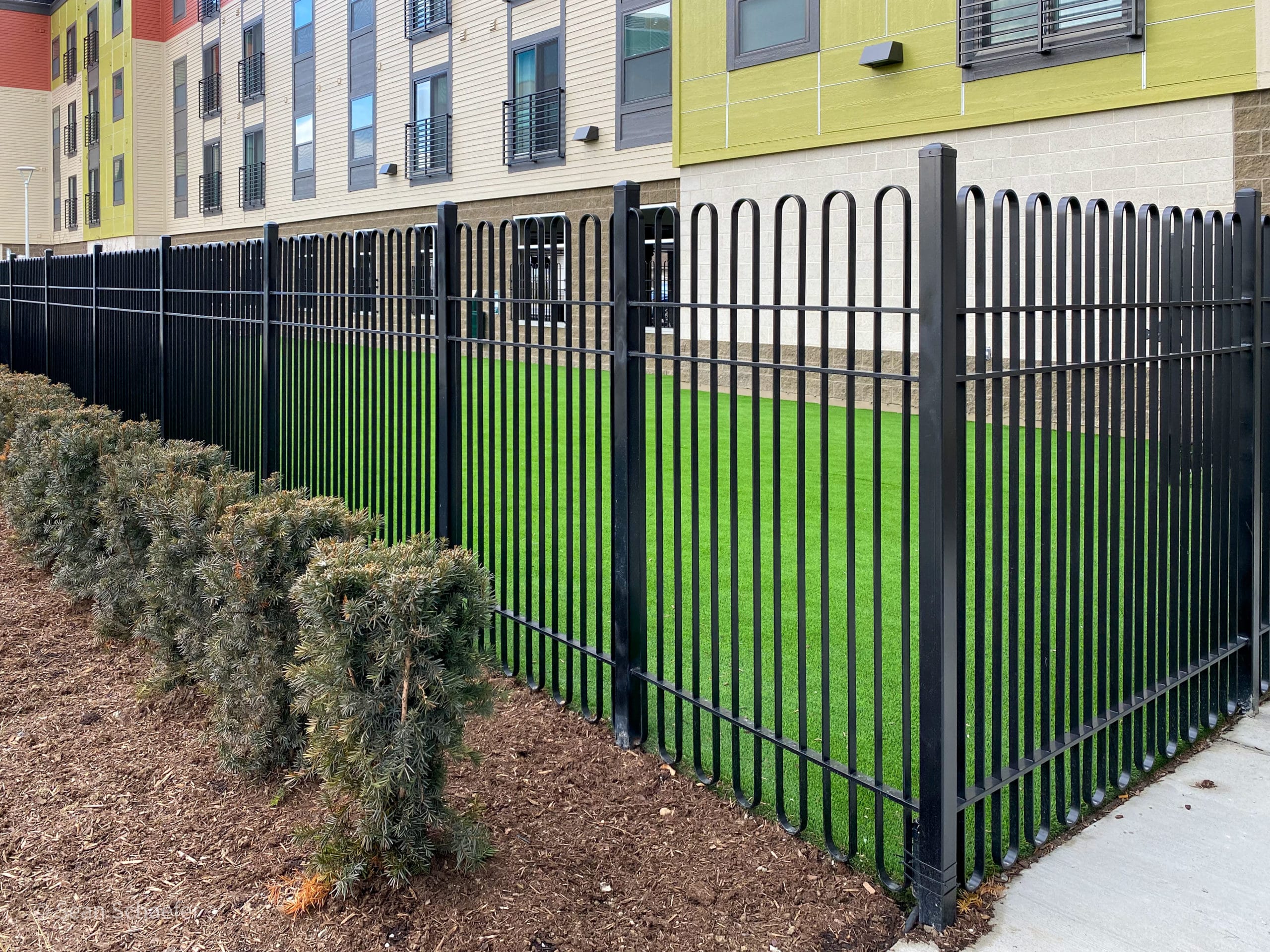 Custom steel looped picket fence