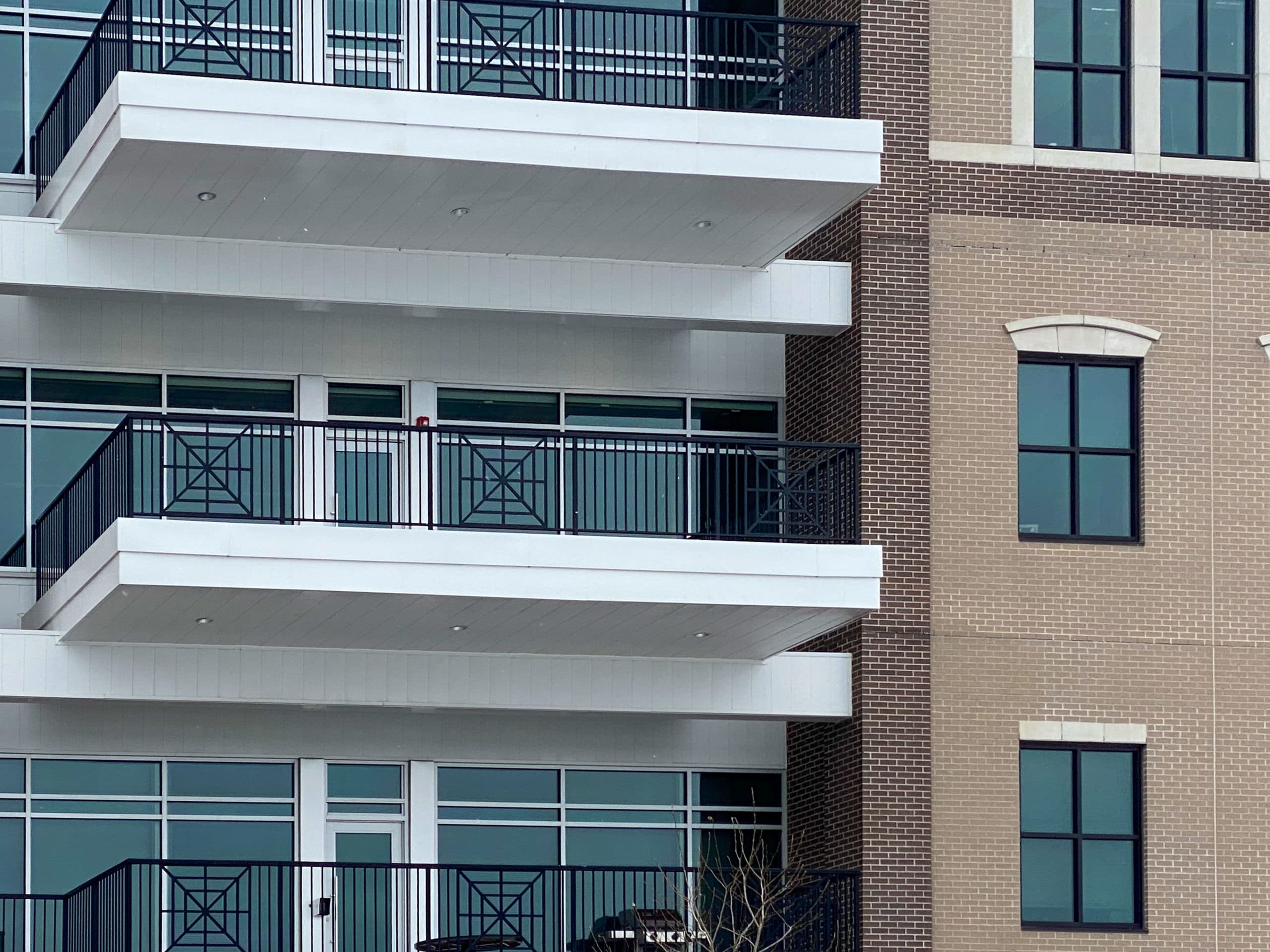 Custom metal (steel) ornamental balcony railings at Uptown Bay City Building 4