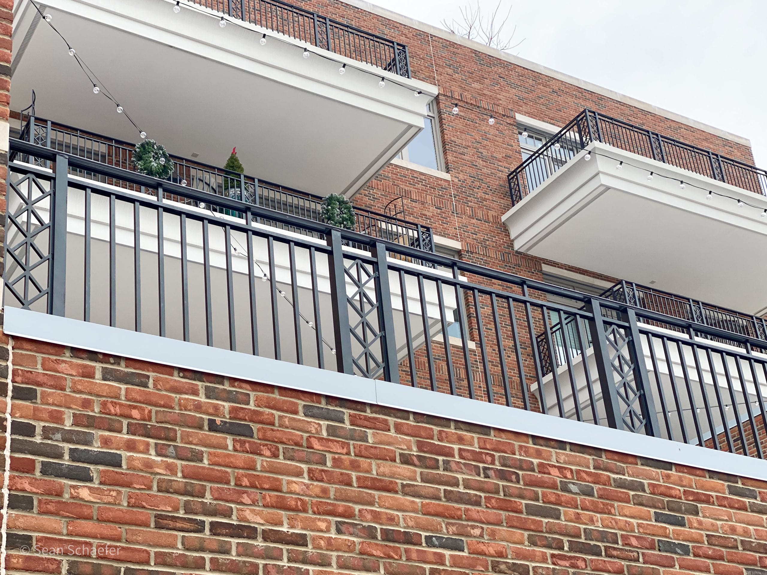 Custom water jet-cut metal (aluminum) railings (balconies/balcony railings) at Midland Mixed-Use Development