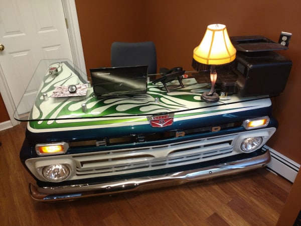 Custom metal desk fabricated from old Ford Bronco front end