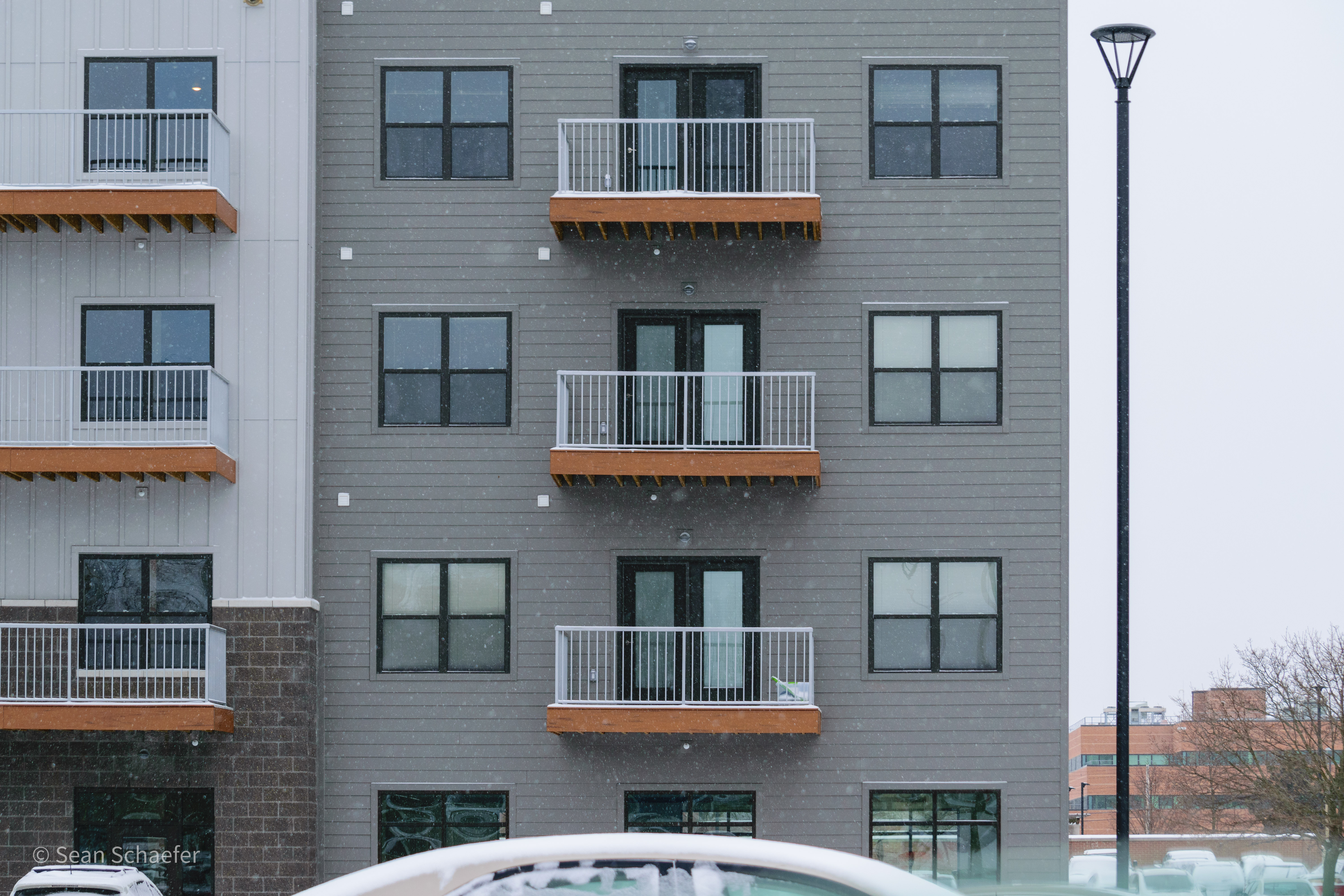 Custom metal (aluminum ACR4500®) balcony railings at Metro Place Apartments