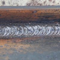 Metal fabrication using stick welding